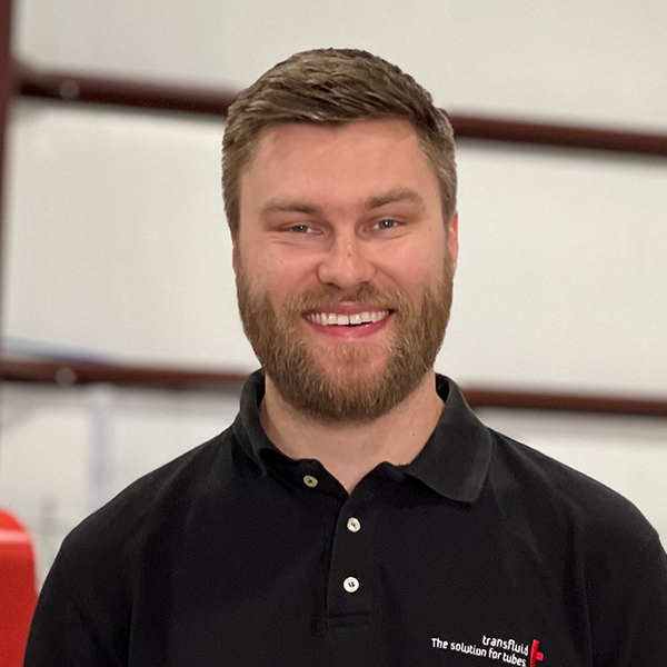 Porträt eines Mitarbeiters im technischen Service von transfluid.