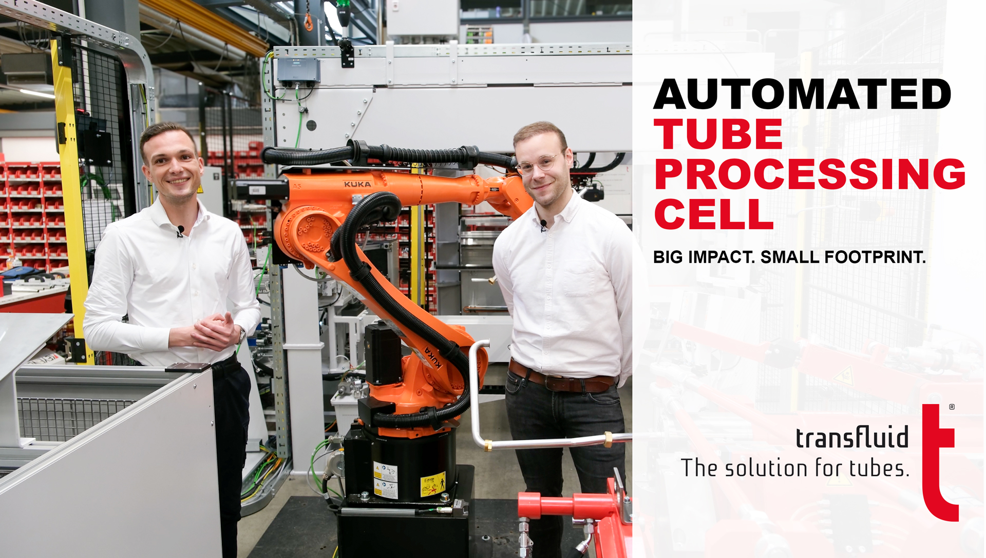 Automated Tube Processing Cell mit KUKA Roboter und zwei Mitarbeiter in Fertigungszelle.